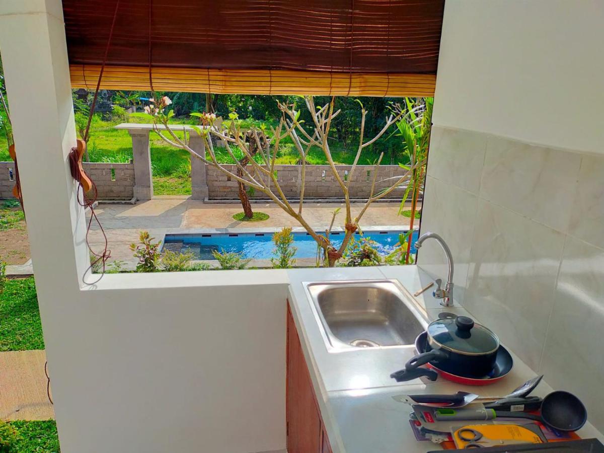 Okaoki Homestay Amed Екстериор снимка